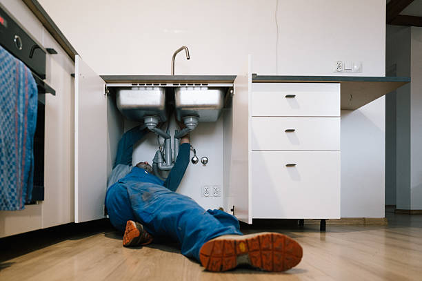 Professional Emergency Plumber technician working in Baltic, CT